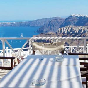 Balcony overlooking blue waters of Santorini