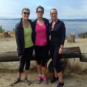 3 women posing for a photo after a hike