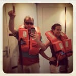 Couple posing with life jackets on