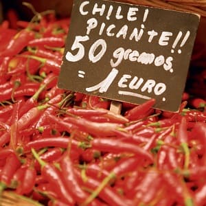 Spain, Barcelona, red chillies on market stall