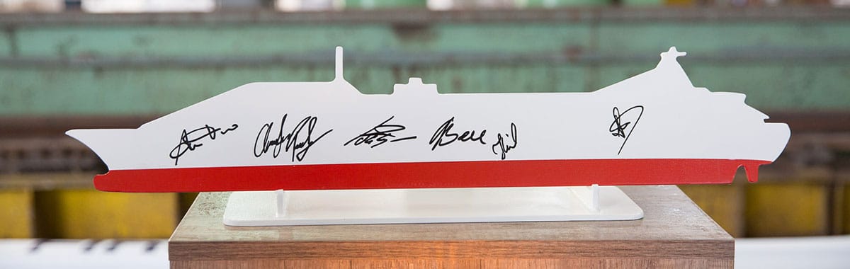 Signed steel cutout of a ship