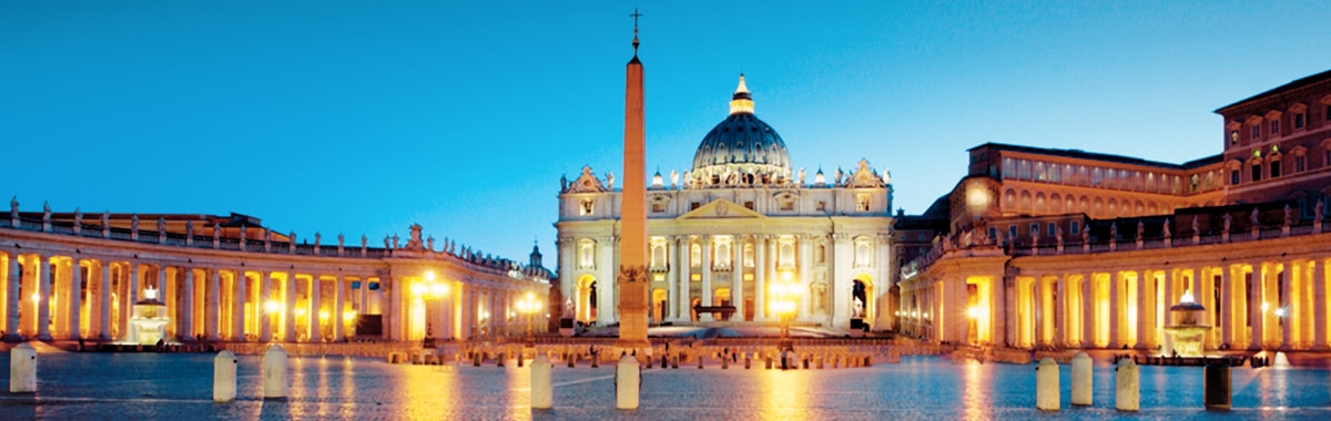 St. Peter's Basilica lit up at dusk