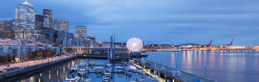 Seattle skyline lit up at at dusk