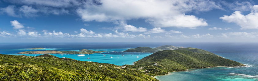 Aerial view of green islands against the blue ocean