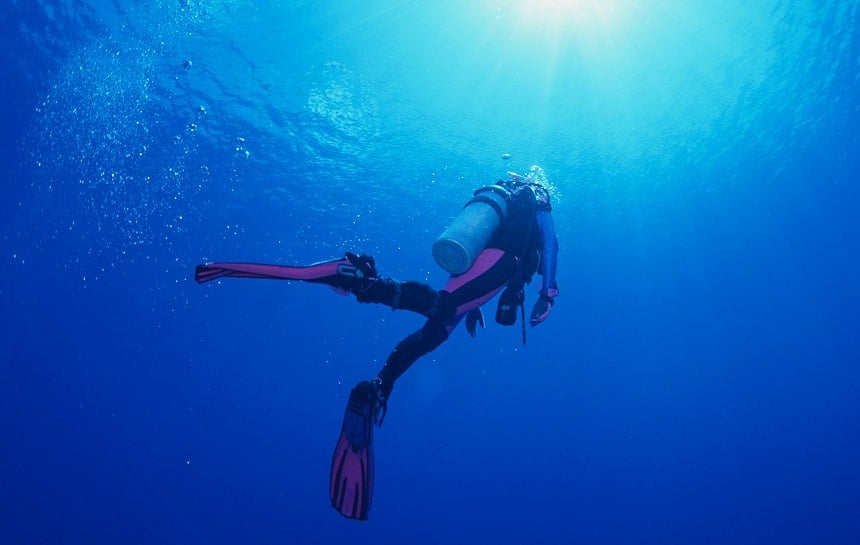 Woman scuba diver in water