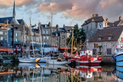 Honfleur is one of the most magical ports on Chef Gabriel Kreuzer's James Beard Foundation voyages on Windstar./Adobe